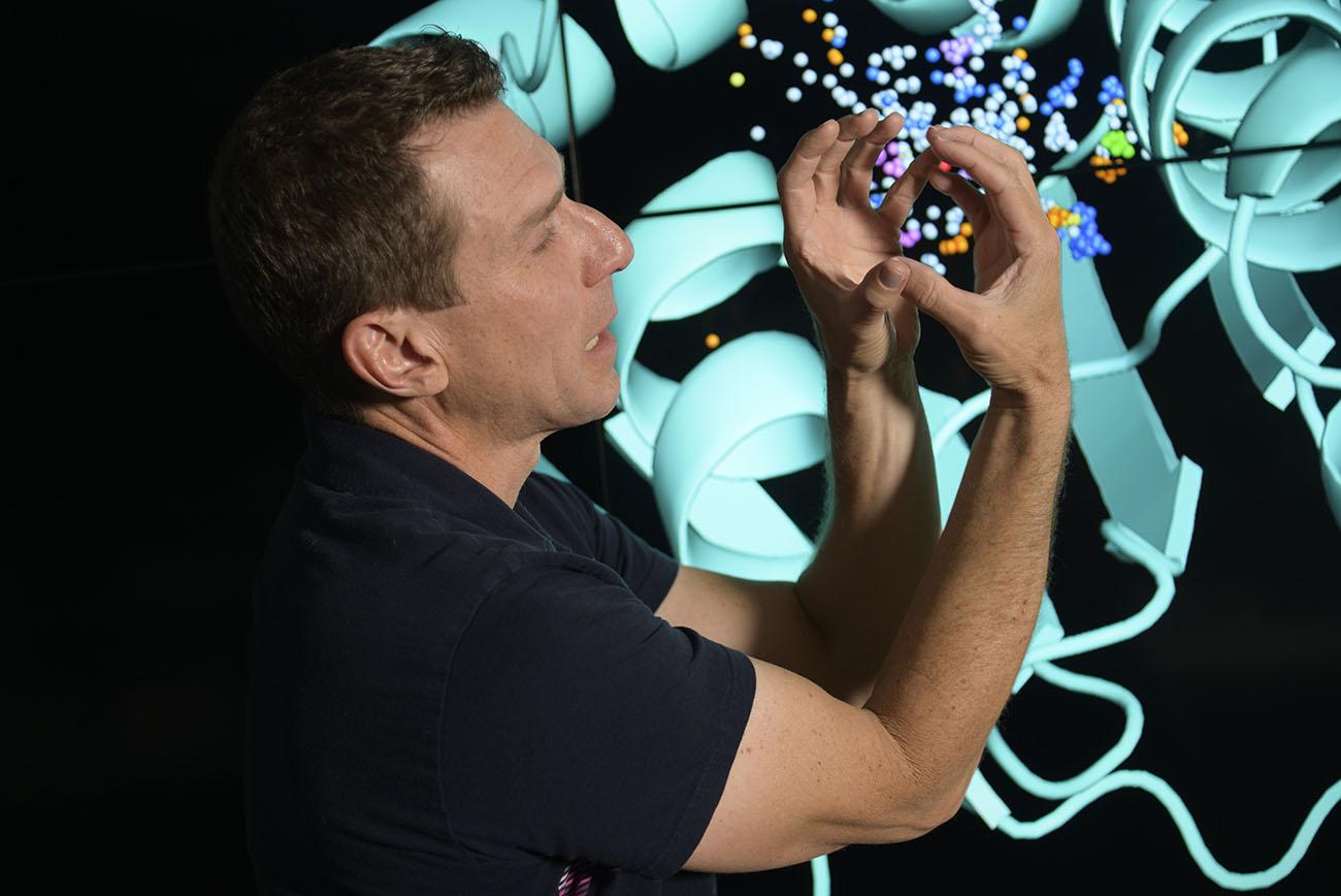 After noticing that his drug affinity visualization tool was wrong, Dr. Wheeler attempted to grab the molecule saying “Dang it, bind already!”.